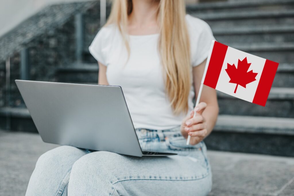 Canada PR women holding Canadian Flag